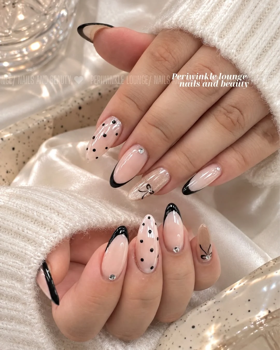 Noir French nail art at Periwinkle Lounge
